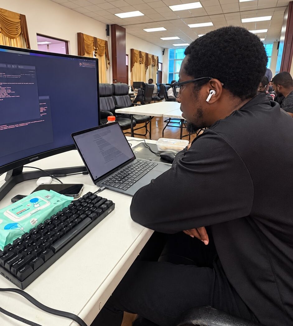 Ken Taylor at his laptop during Innovation Challenge 2026